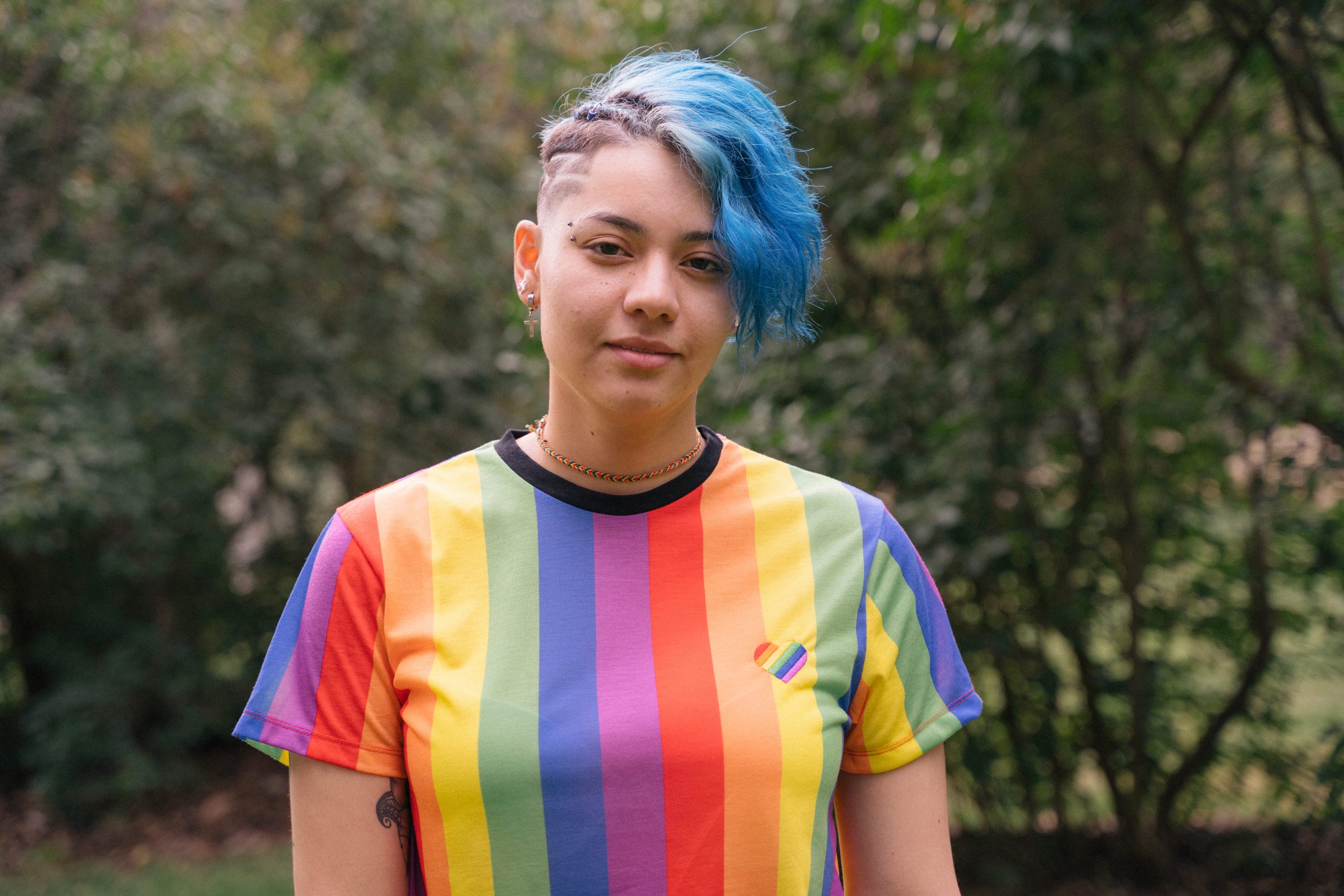 Girl in rainbow shirt